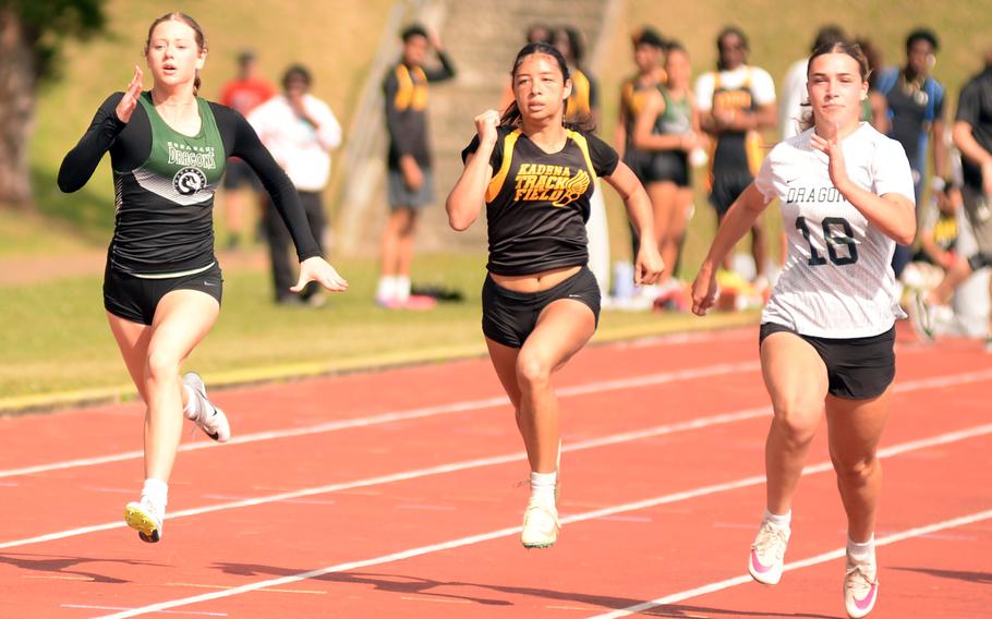 The top three racers run in the girls 100 meters.