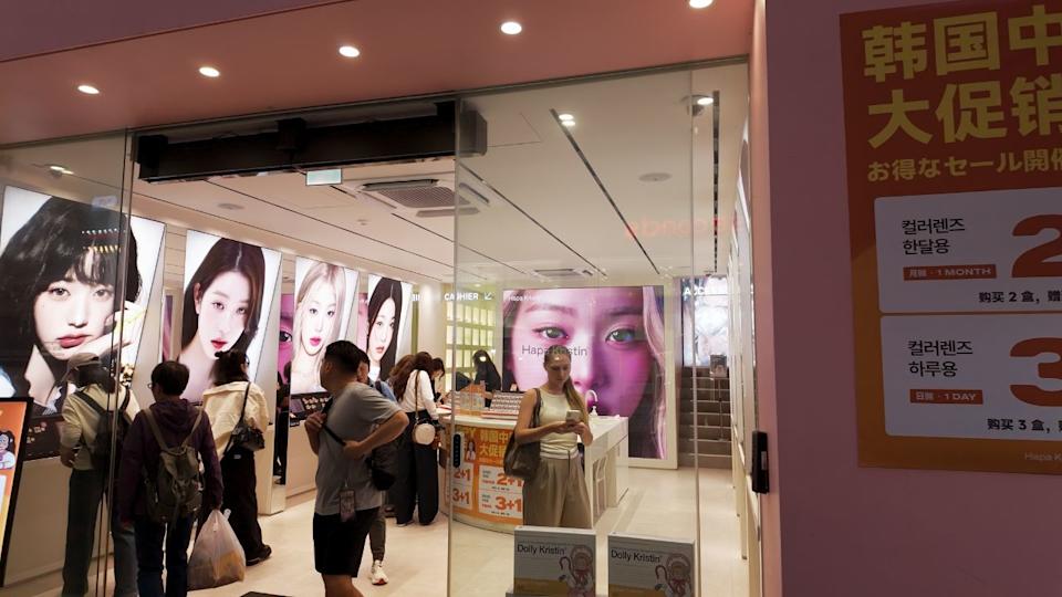 SEOUL, SOUTH KOREA - OCTOBER 11, 2025 - Storefront featuring K pop inspired beauty products attracting shoppers in a vibrant urban area