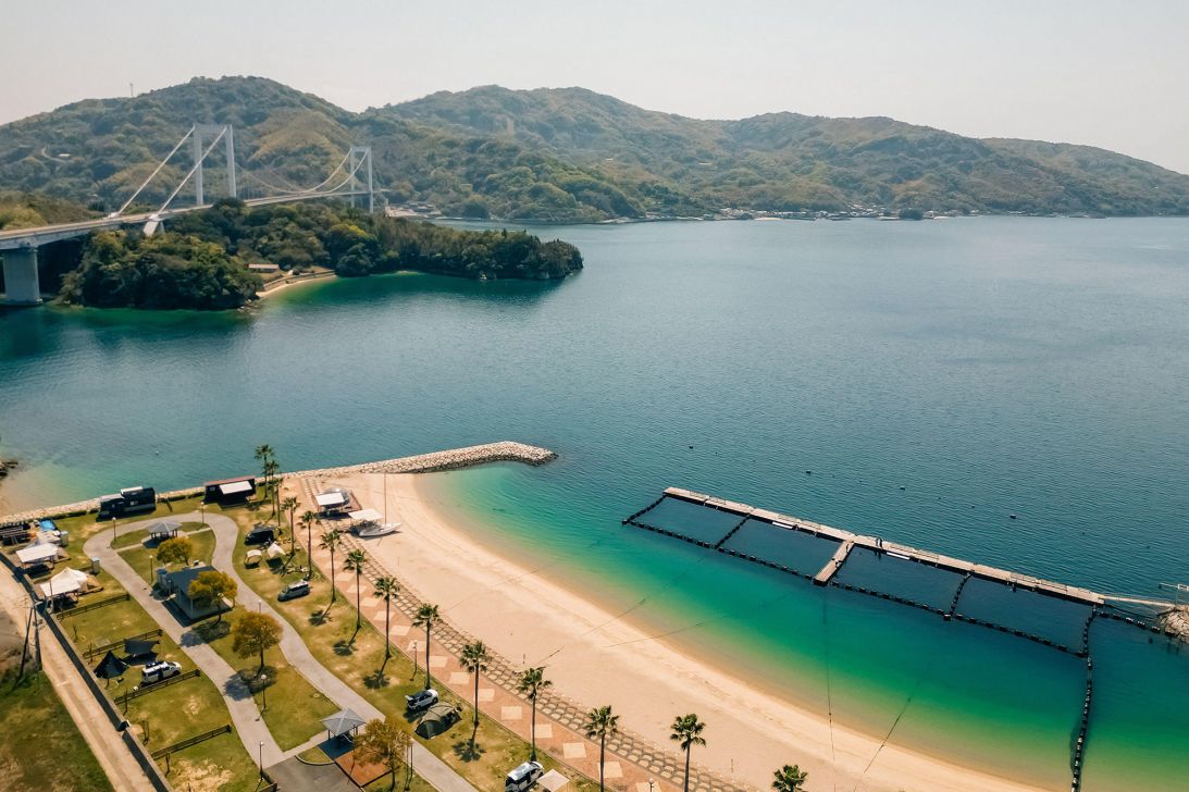 The Hakata-Oshima Bridge sits next to Hakata Beach.