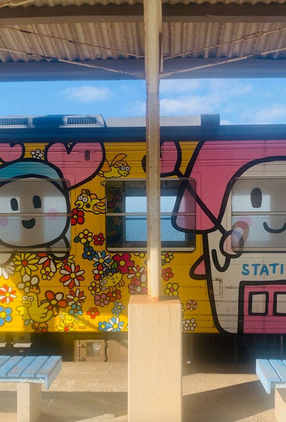 Reccha-kun, a “train fairy mascot” decorates railway carriages at Shimonada station.