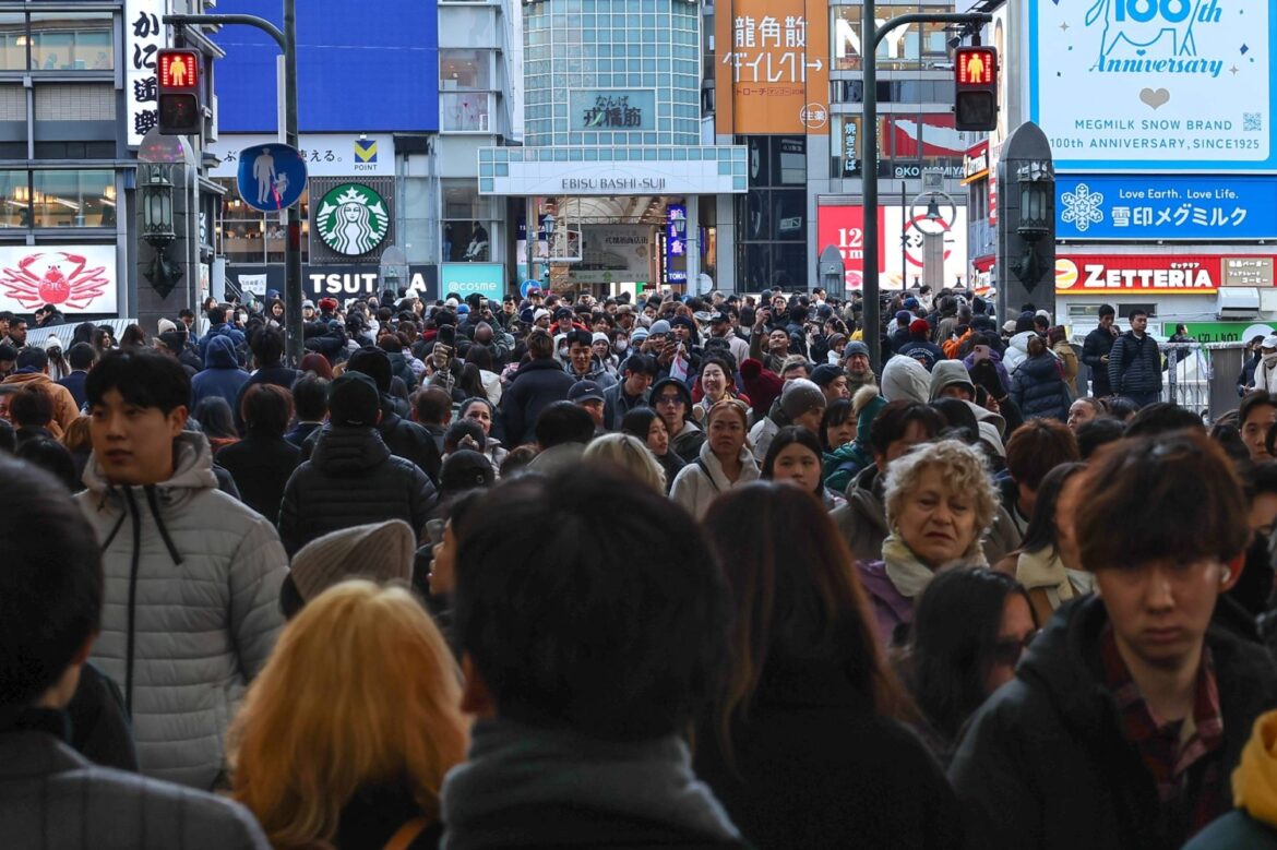 Japan's foreign resident population hits record 4.12 million