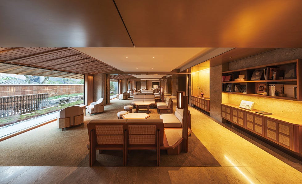 Modern interior space featuring cozy seating and natural light.