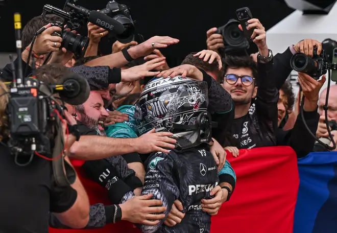 Kimi Antonelli of Mercedes-AMG Petronas F1 Team celebrates with members of his team after winning the 2026 Japanese Grand Prix at Suzuka Circuit in Suzuka, Mie Prefecture, Japan, on March 29, 2026