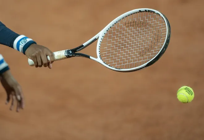 Sep 27, 2020; Paris, France; Cori Gauff (USA) reaches for the ball prior to her serve during her match against Johanna Konta (GBR) on day one at Stade Roland Garros.