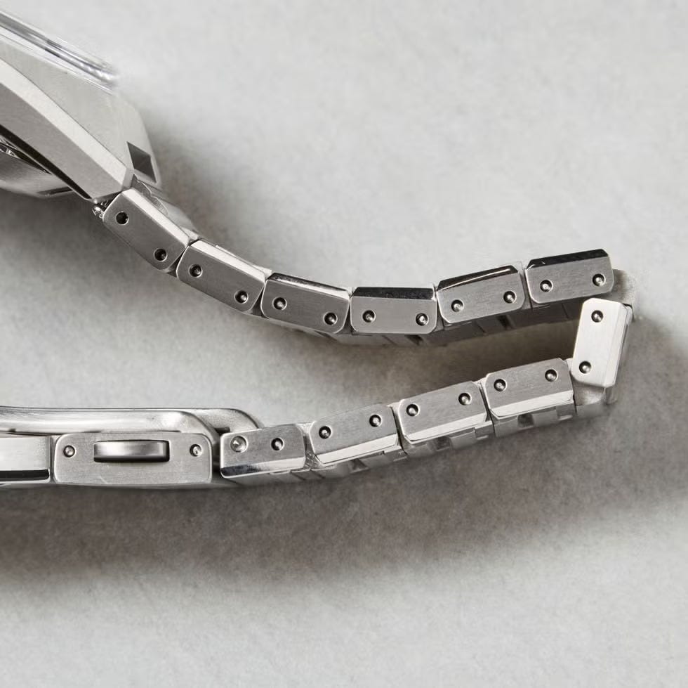 closeup view of a metal watchband with linked segments