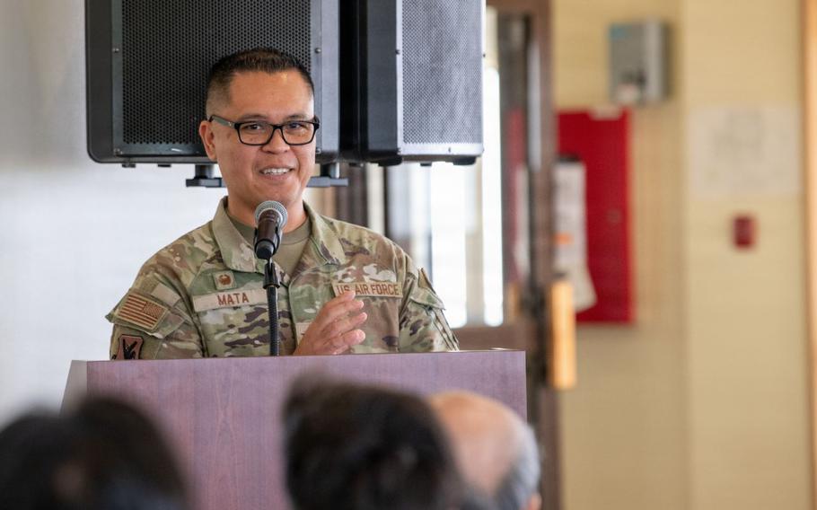 U.S. Air Force Col. Robinson Mata, 18th Mission Support Group commander, briefs members of the U.S.-Japan Conference on Cultural and Educational Interchange at Kadena Air Base.