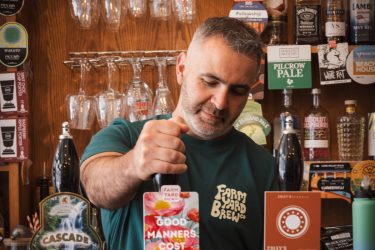 Gary Quinn pulling a pint at Guild Ale House Pic: Calum Woodhouse