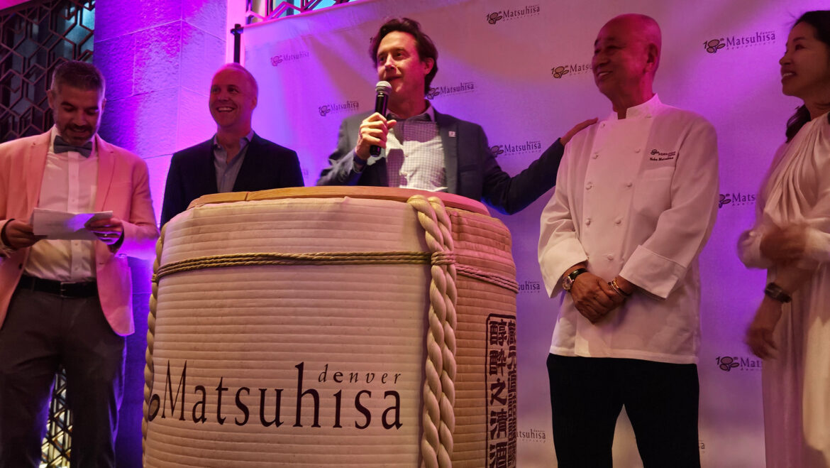 five people on a stage