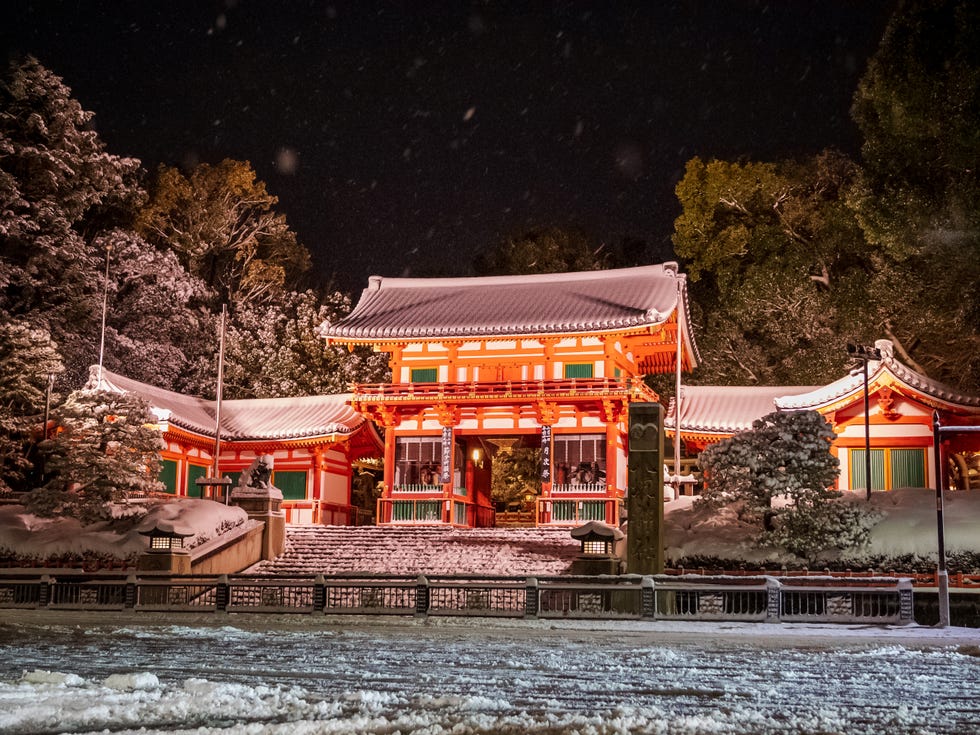 traditional japanese architecture covered in snow at night traditional japanese architecture covered in snow at night