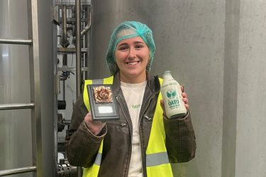 Adele Scott from Oato receiving their Taste Lancashire award at the Fulwood factory