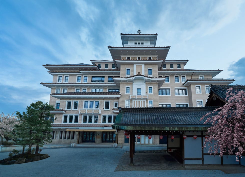 Exterior view of a multi-tiered building with a traditional architectural style.