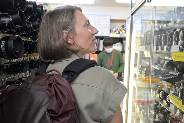 abby in used film camera store