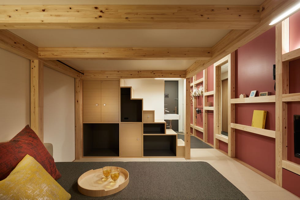 interior space with wooden beams steps and storage interior space with wooden beams steps and storage