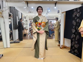 A model wears a full traditional kimono at Oose Shoten.