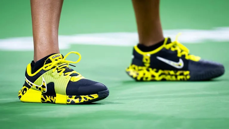Naomi Osaka completed her standout Indian Wells outfit with bold leopard inspired tennis shoes.