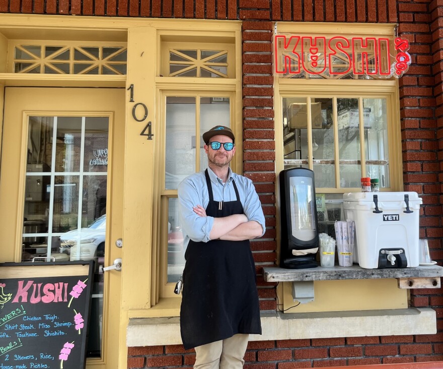 Chef and co-owner Charlie Keller stands outside Kushi & Co. Keller, formerly executive chef at Spurrier’s Gridiron Grille, opened the restaurant in Bo Diddley Plaza on March 4. (Katie Klaiber/ WUFT News)