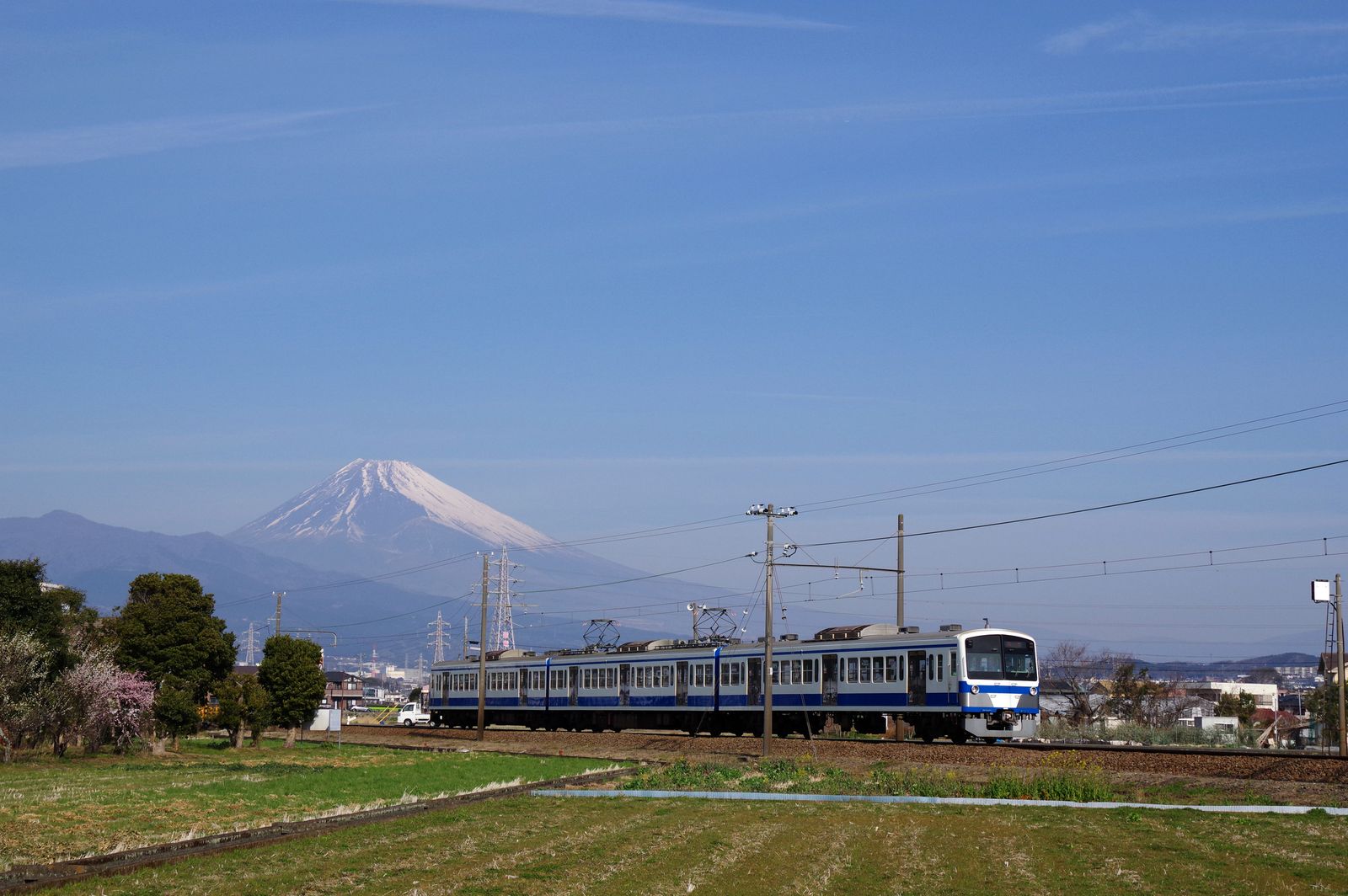 Image may contain Railway Train Transportation Vehicle and Car