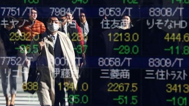 Japan's Nikkei slips from record high on tech drag