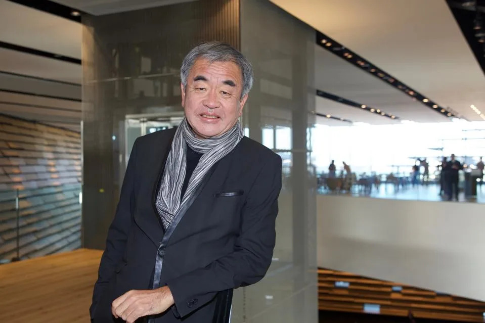 Architect Kengo Kuma poses in the V&A museum in Dundee, Scotland