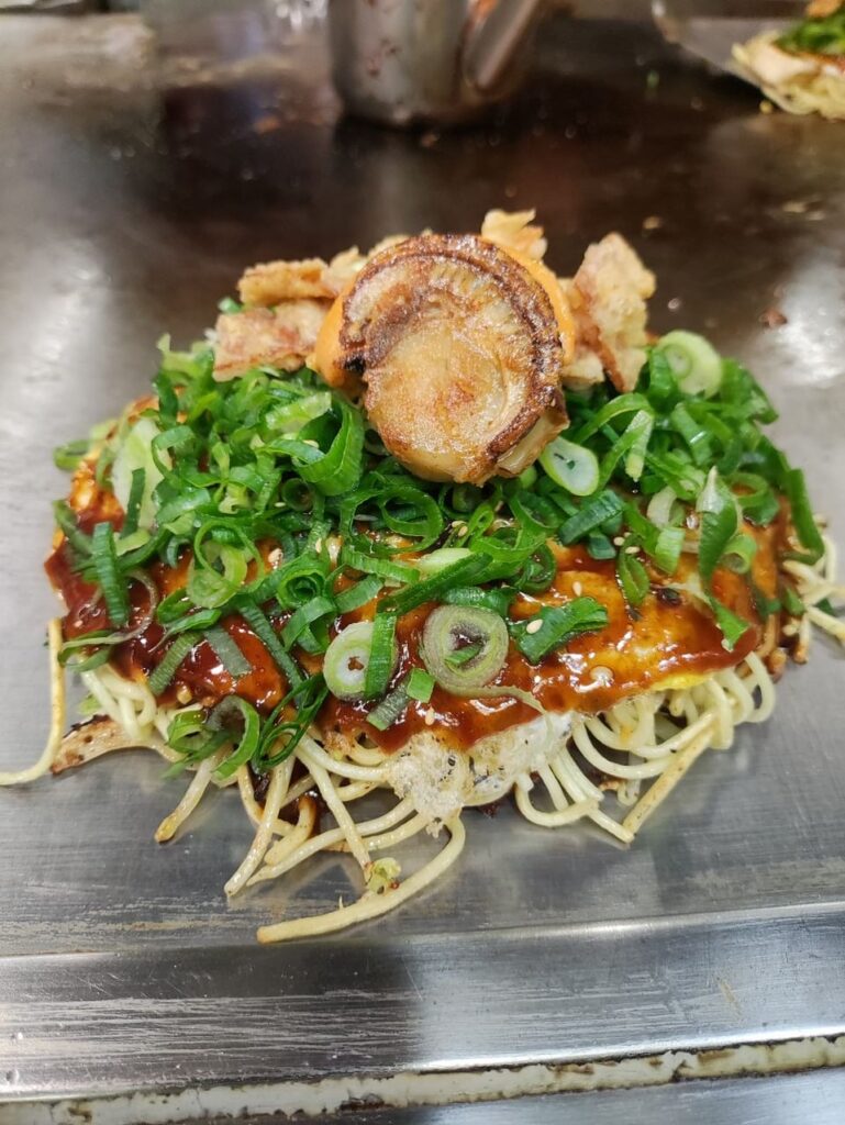 Hiroshima-style okonomiyaki in Okonomimura