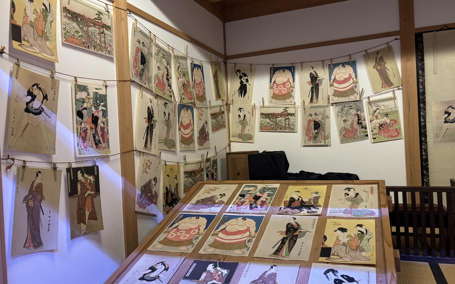 Some ukiyo-e are displayed in a Japanese-style room.