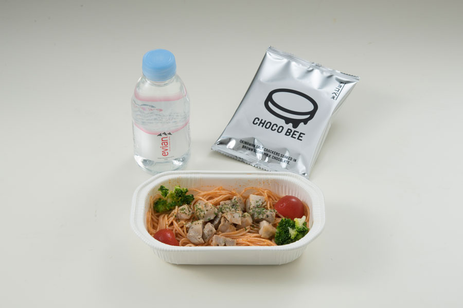Premium Economy Bueno Chicken avocado dog and cold tomato pasta