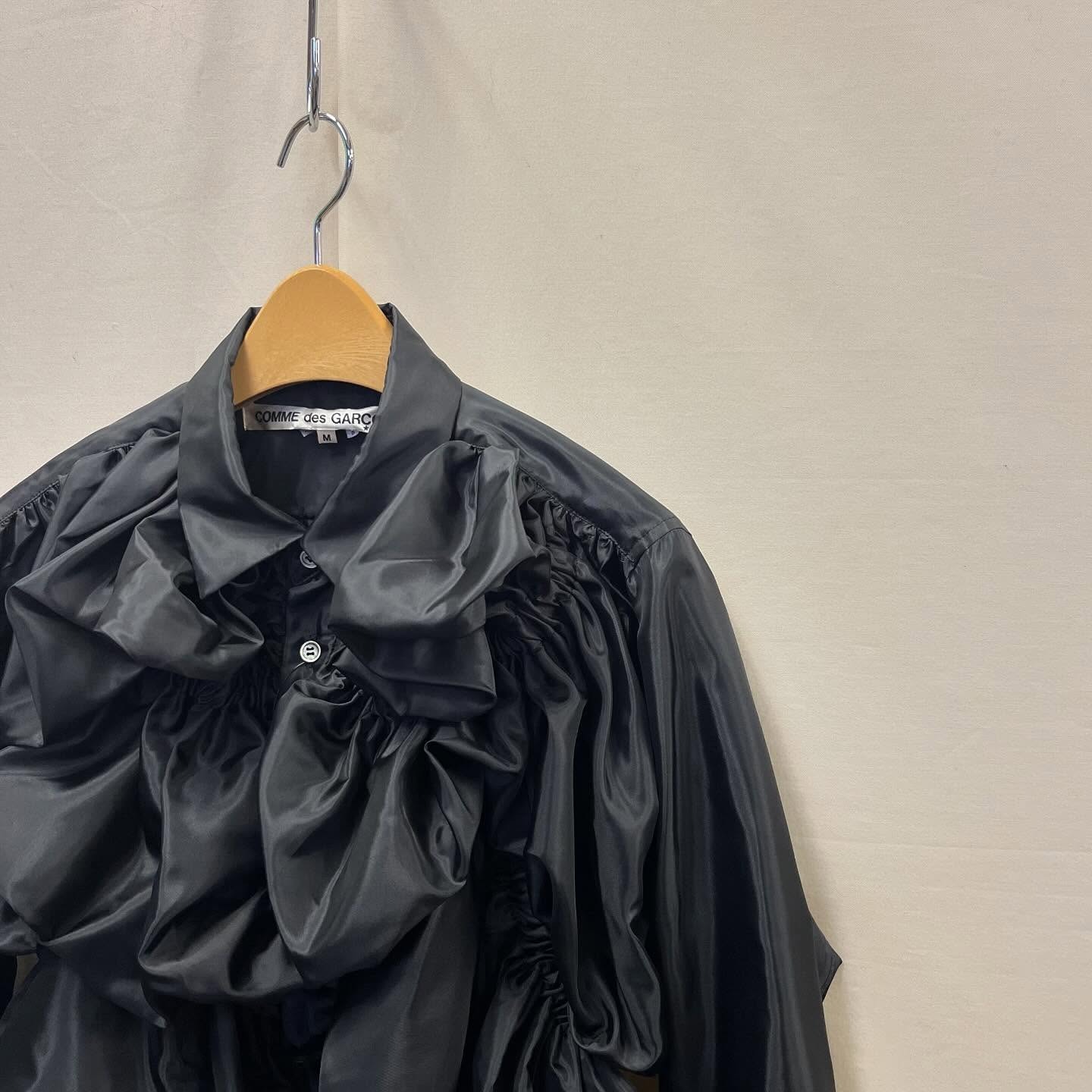 Photo of black Comme Des Garcons vintage clothing at Tokyo store.