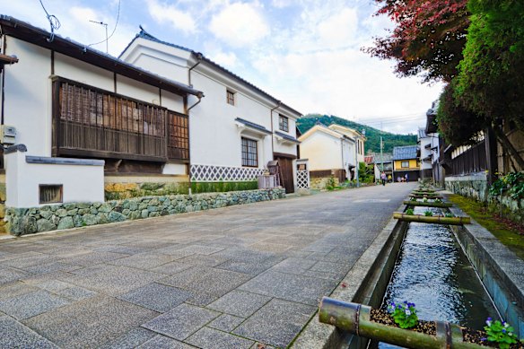 A narrow waterway on Ohanahan Street, in Ozu’s old town, is home to freshwater koi, or carp.