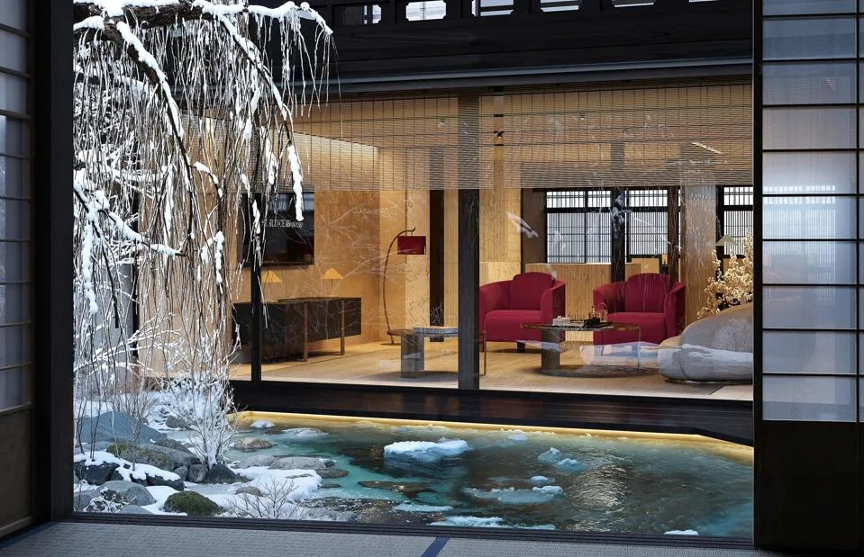 Garden pond in winter looking to seating area in Kyoto residence by Kengo Kuma and Armani Casa