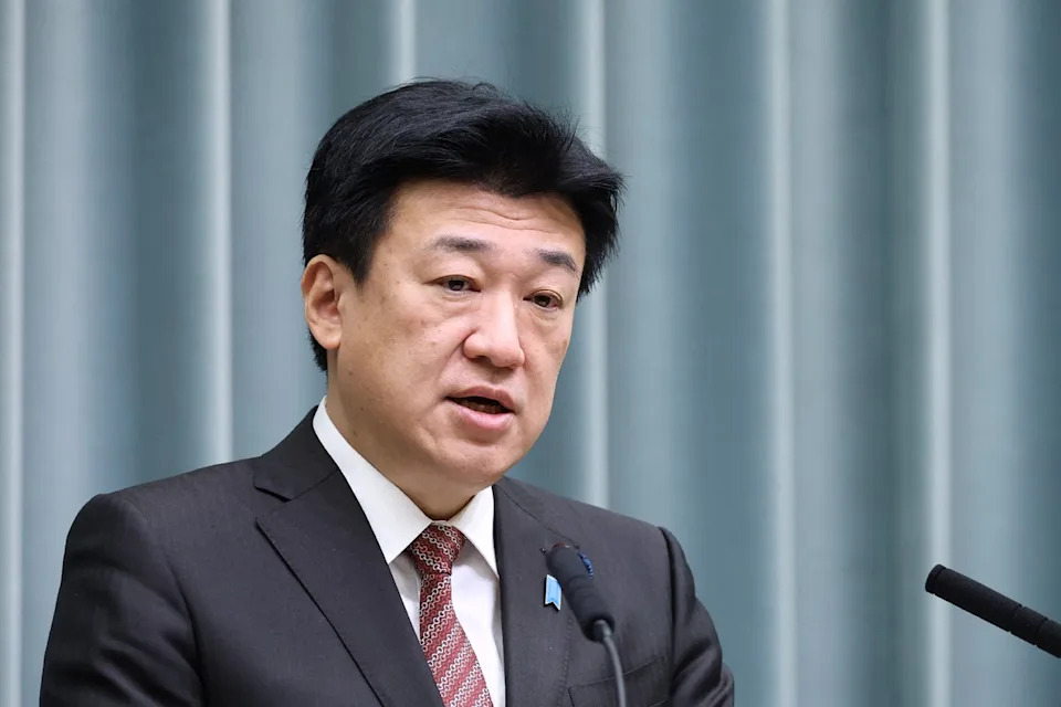 Japan's Chief Cabinet Secretary Minoru Kihara (JIJI Press/AFP via Getty Images)