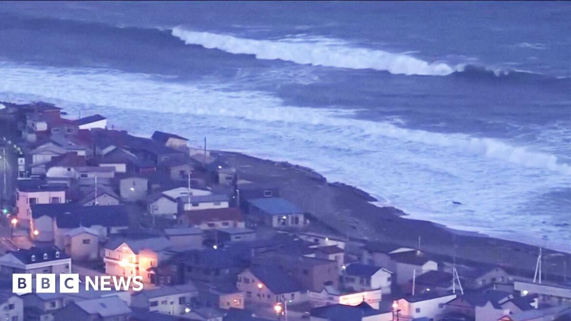 Japan tsunami warnings downgraded as people describe 'low rumbling' as earthquake hit