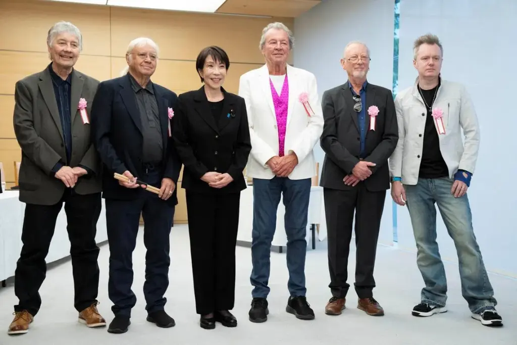 Rock band Deep Purple thrills Japan’s superfan Prime Minister Takaichi with a quick visit Japan's Prime Minister Sanae Takaichi poses with members of British rock band Deep Purple - Don Airey, Ian Paice, Ian Gillan, Roger Glover and Simon McBride - during their meeting at the Prime Minister's Office in Tokyo, on April 10, 2026.
