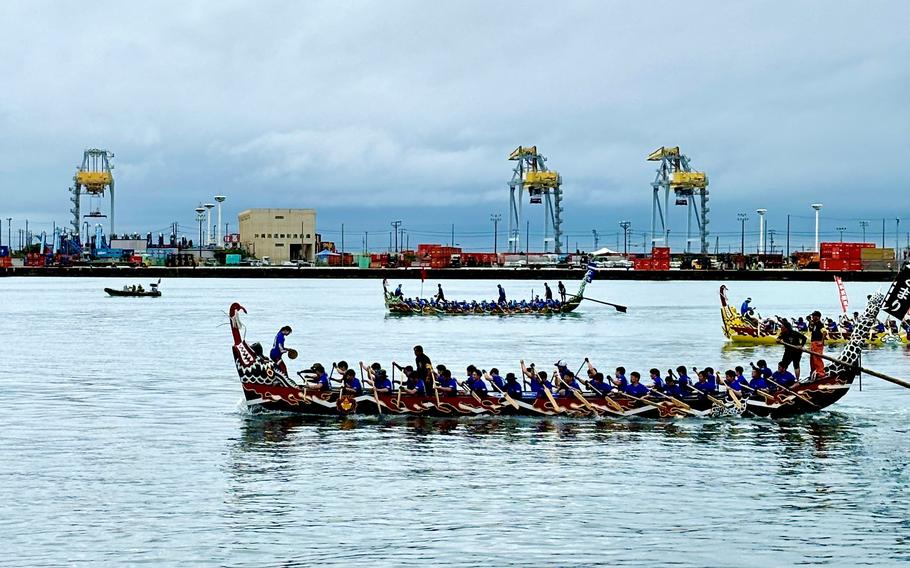 People rowing a boat during Naha Dragon Boat Race.