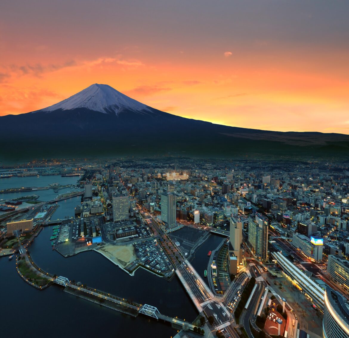 Mount Fuji at sunset over the city of Yokohama in Japan