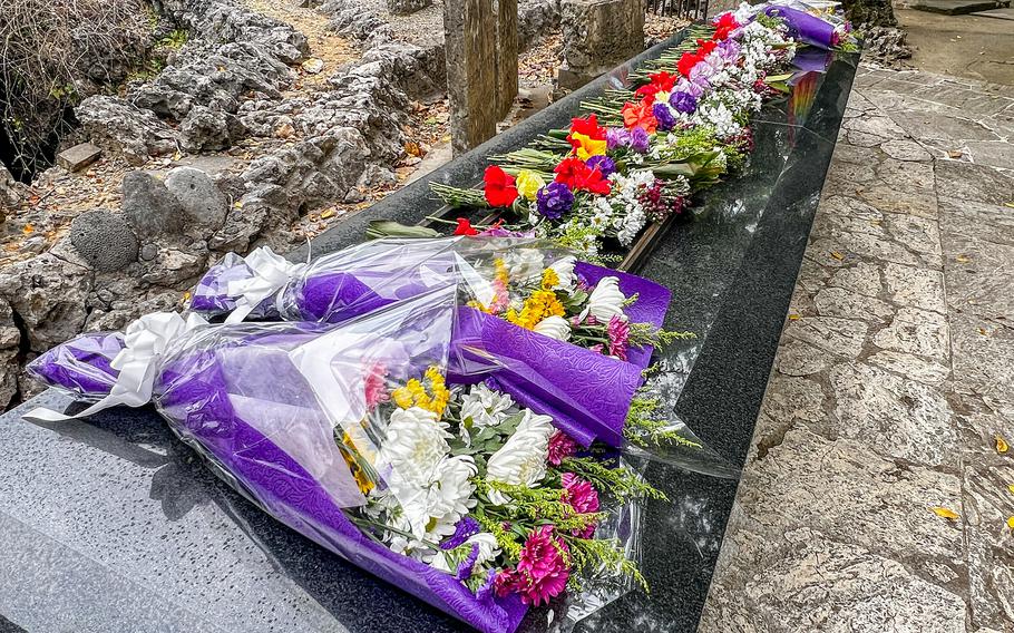 Flowers are placed in a row.