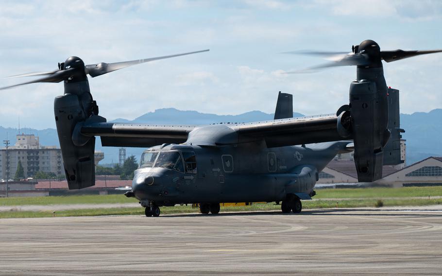 A U.S. Air Force CV-22 Osprey of the 353rd Special Operations Wing lands on a runway.