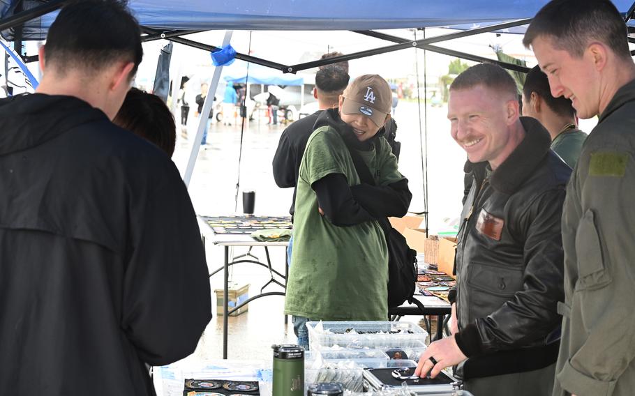 Marine Corps MV-22 Osprey pilots talk with festival attendees.