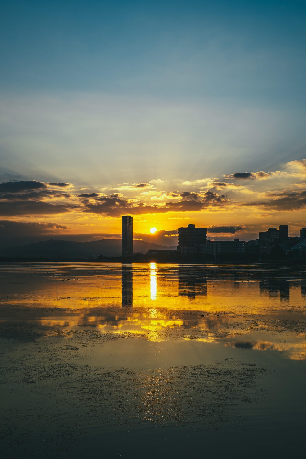 [OC]Sunrise over Lake Biwa reflected in the shallows, Otsu, Shiga.