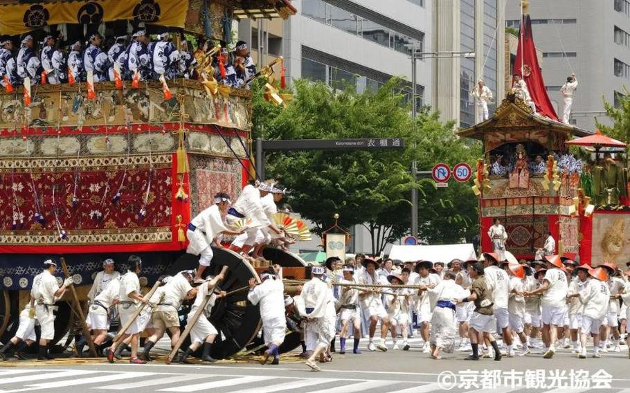 People are pulling portable shrines.