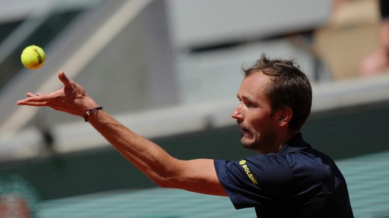 Daniil Medvedev of Russia serves to Adam Walton of Australia...