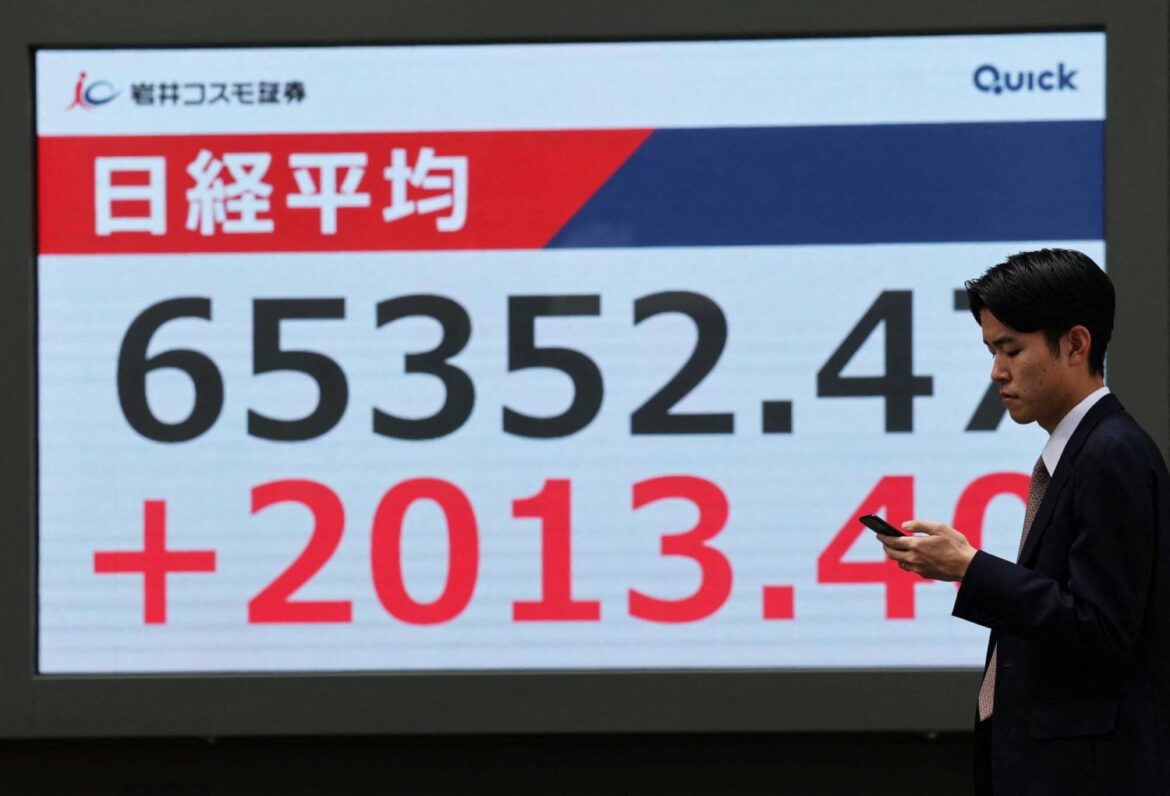 Nikkei 225 stock average tops 65,000 for first time