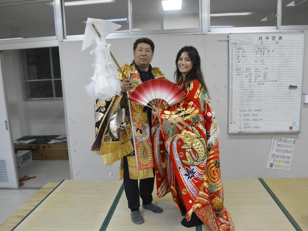 Dressed in tradiional clothing from Japanese mythology.