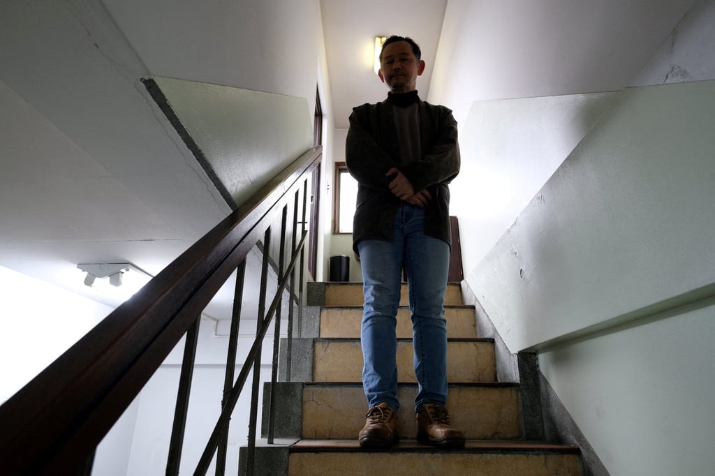 A 55-year Japanese man who chose to shut himself away from society poses for a picture in Tokyo in 2018. Photo: AFP