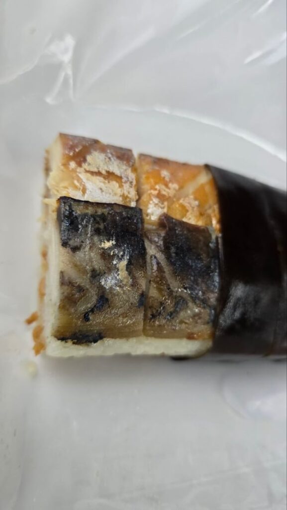 yaki saba (grilled mackerel) sushi wrapped in kombu kelp
