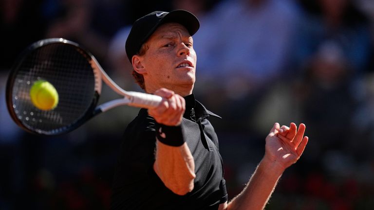 Italy's Jannik Sinner returns the ball to Australia's Alexei Popyrin, during their match at the Italian Open