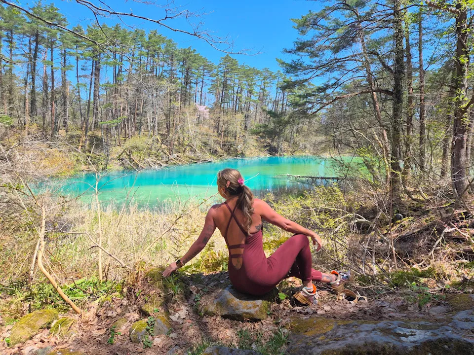 A woman hiking in a volcanic park in Fukushima Japan