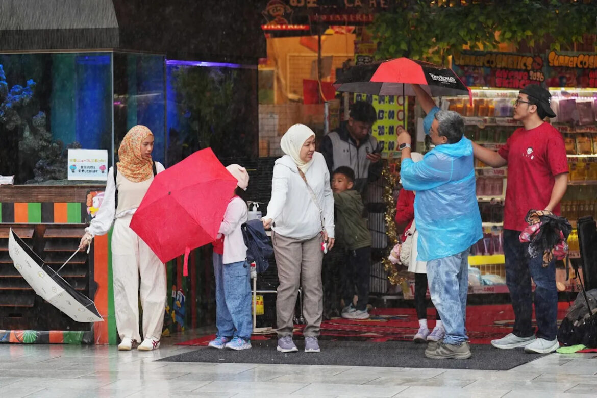 Heavy rain from tropical storm raises flood risks in the Tokyo region