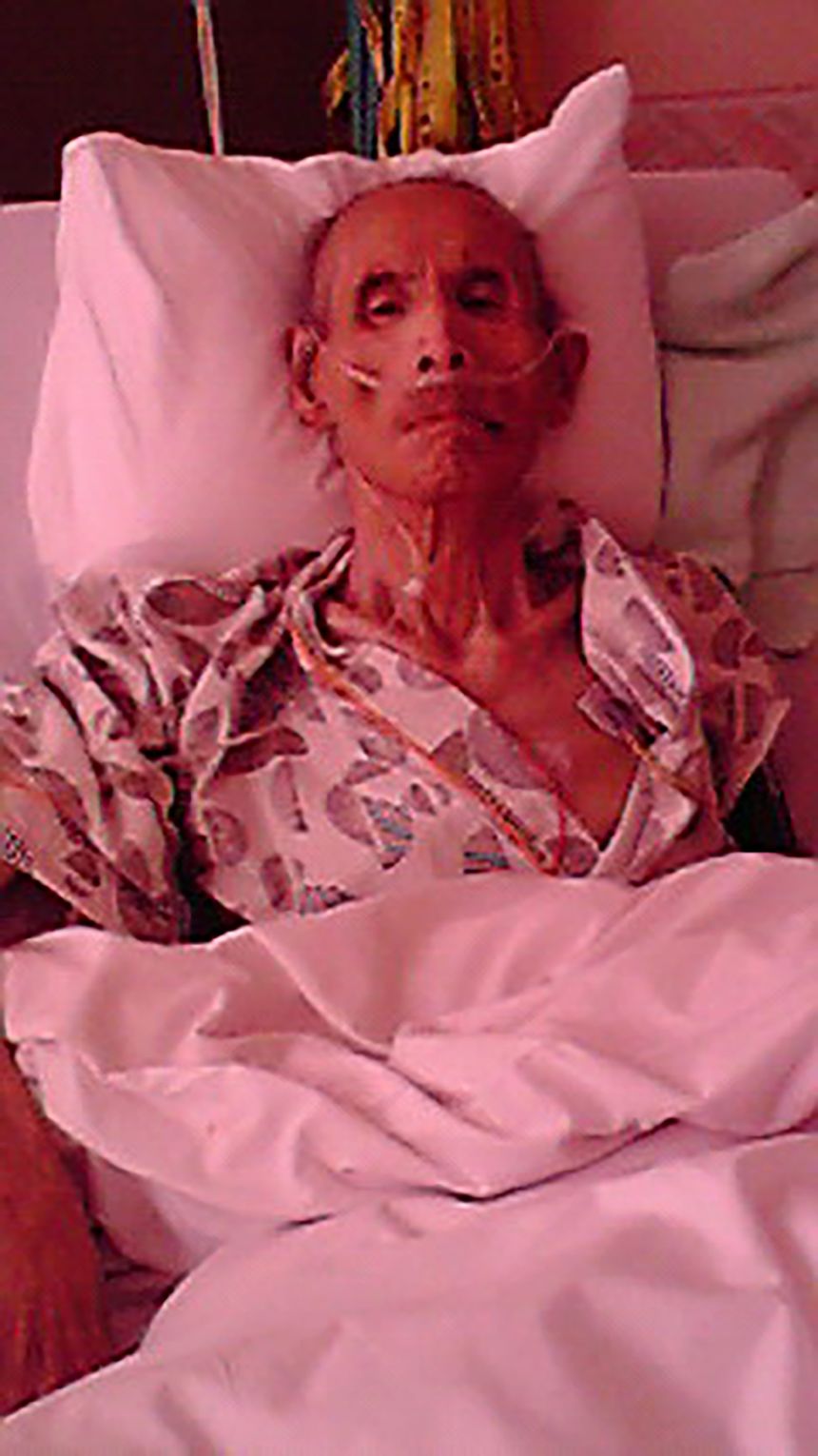 Hiromu Sakahara in hospital after contracting pneumonia.