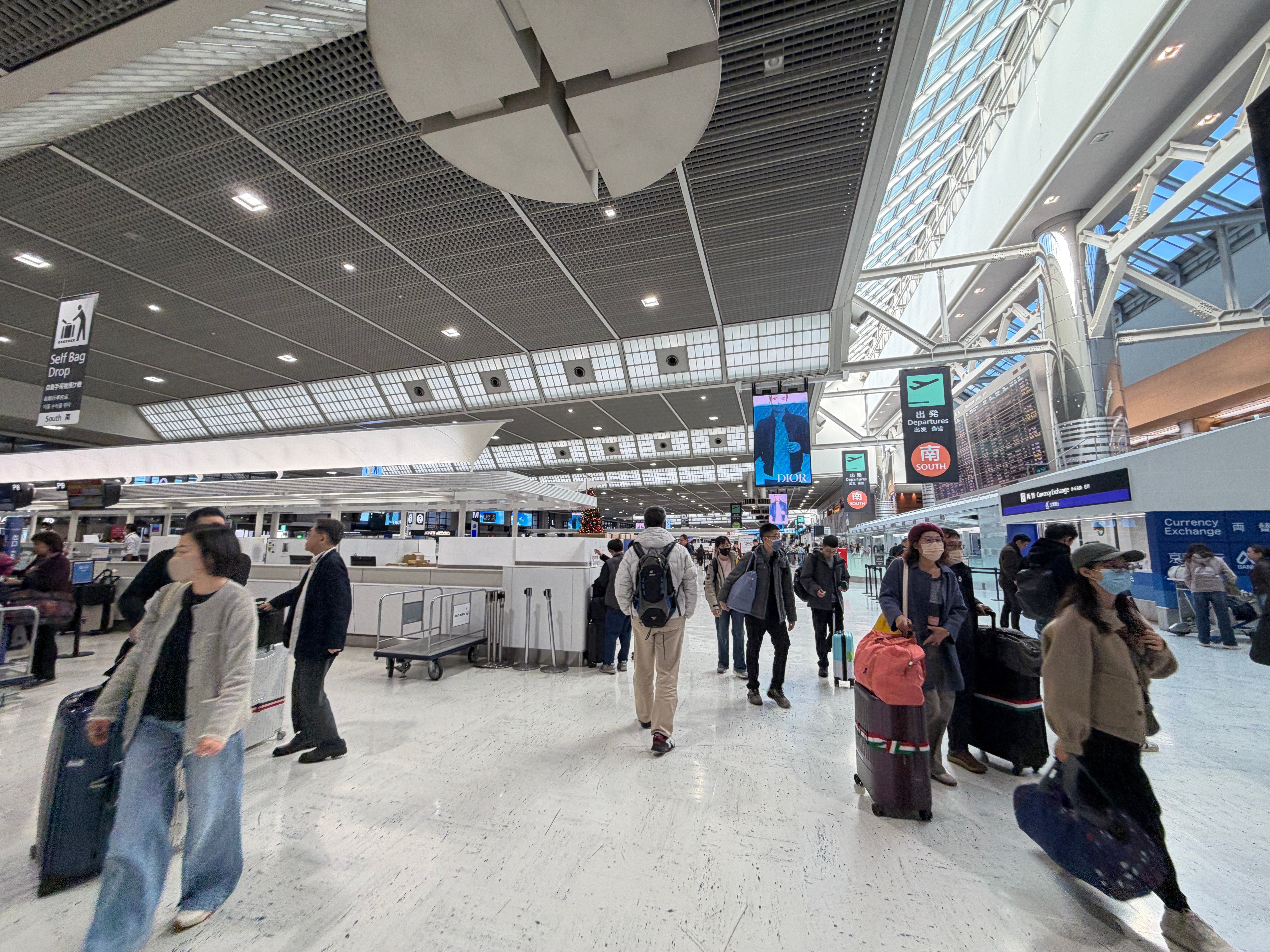 Travelers at Tokyo Narita Airport in Japan