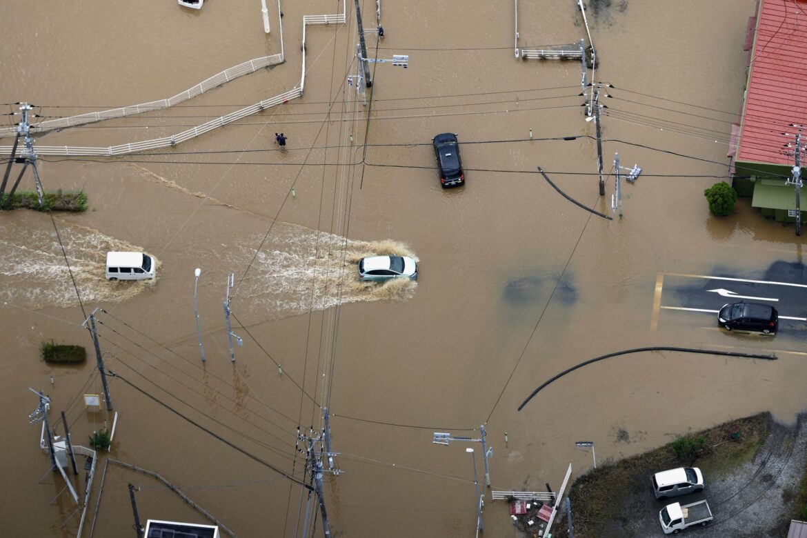 Heavy rain causes flooding near Tokyo that kills 4 and disrupts train and air travel Heavy rain causes flooding near Tokyo that kills 4 and disrupts train and air travel